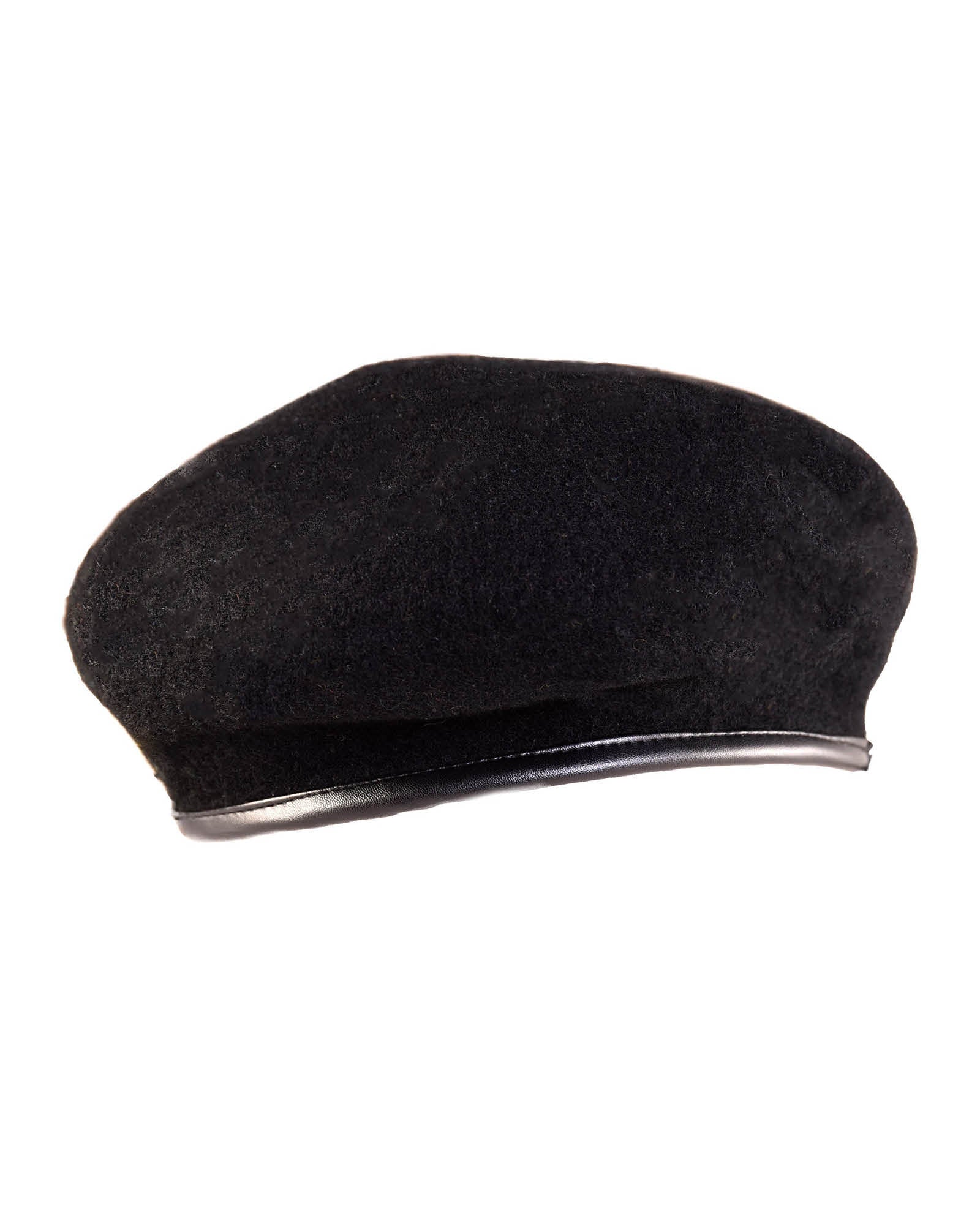 Studio shot of The Château Beret in black wool with leather-bound edge, minimal and classic silhouette.
