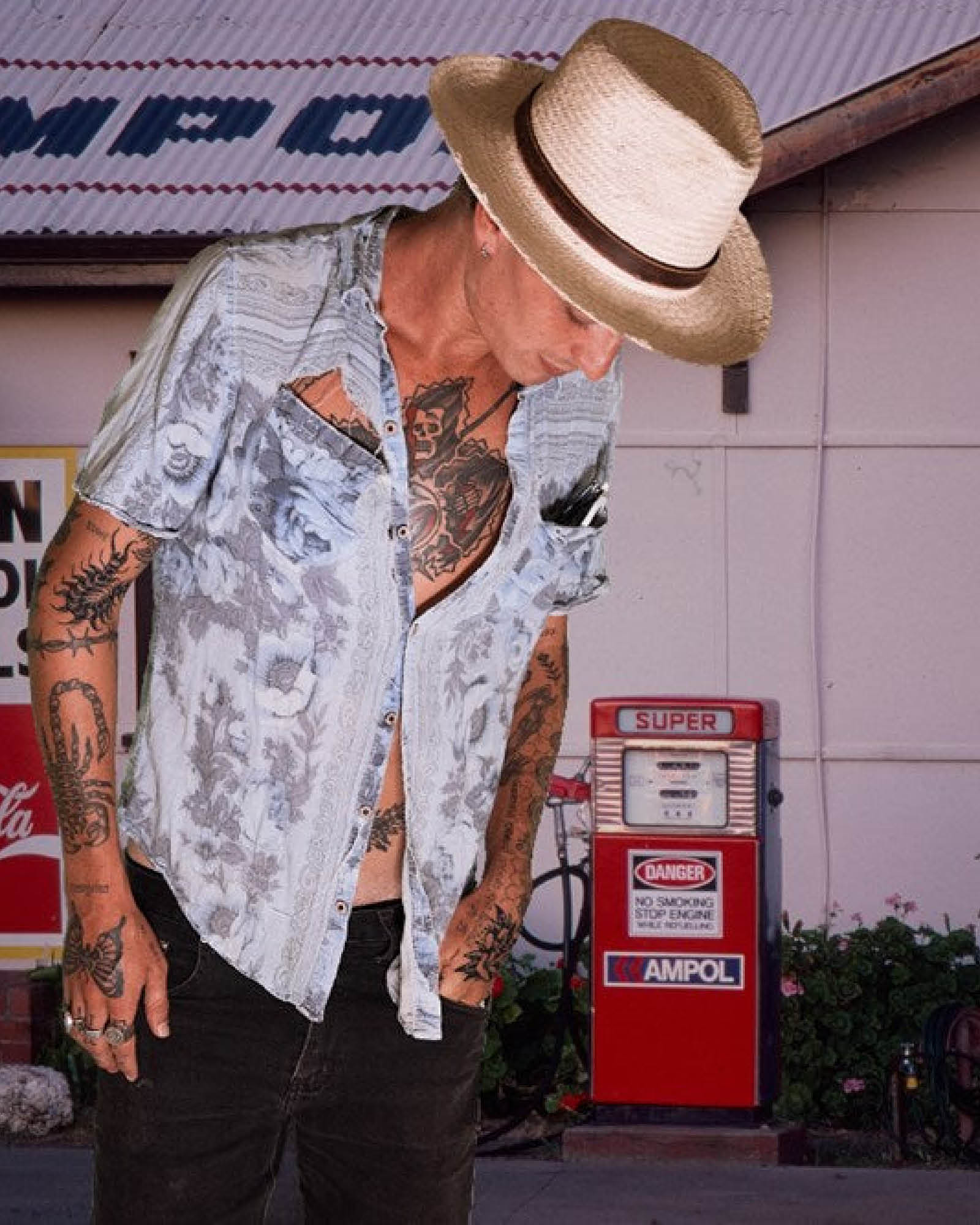 Bromley Artist Collaboration Straw Hat, woven straw design with embossed signature detail.