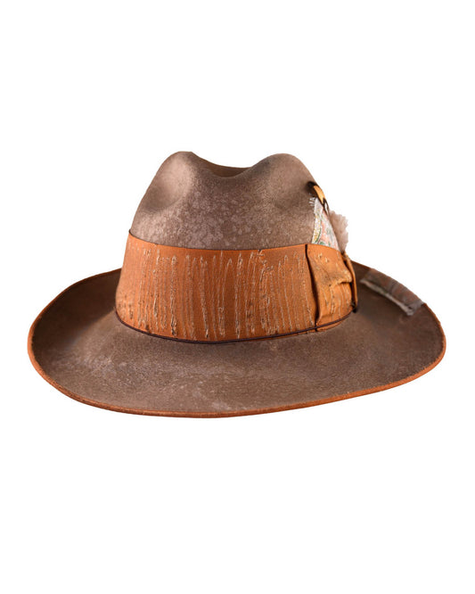Side view of the EP Vintage Hat – Elmwood colourway, showcasing the burnt orange grosgrain ribbon, feather accent, and softly weathered texture. A timeless piece blending rustic style with elevated detailing.