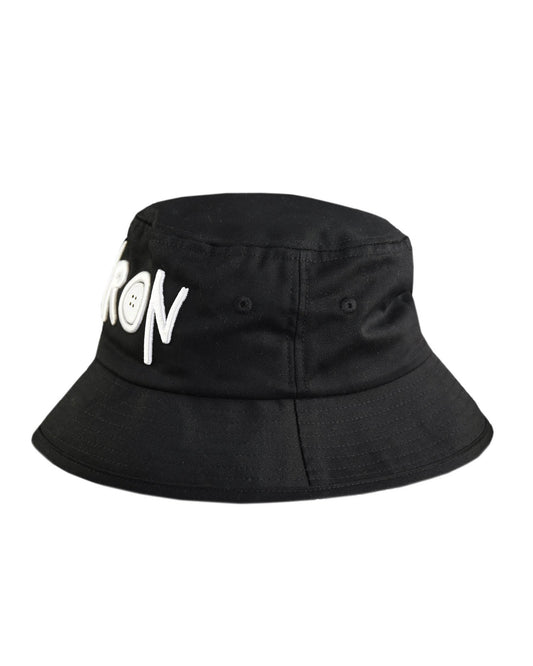 Side view of The Rusty BYRON bucket hat in black cotton twill, showing clean silhouette and soft structure, perfect for everyday wear.