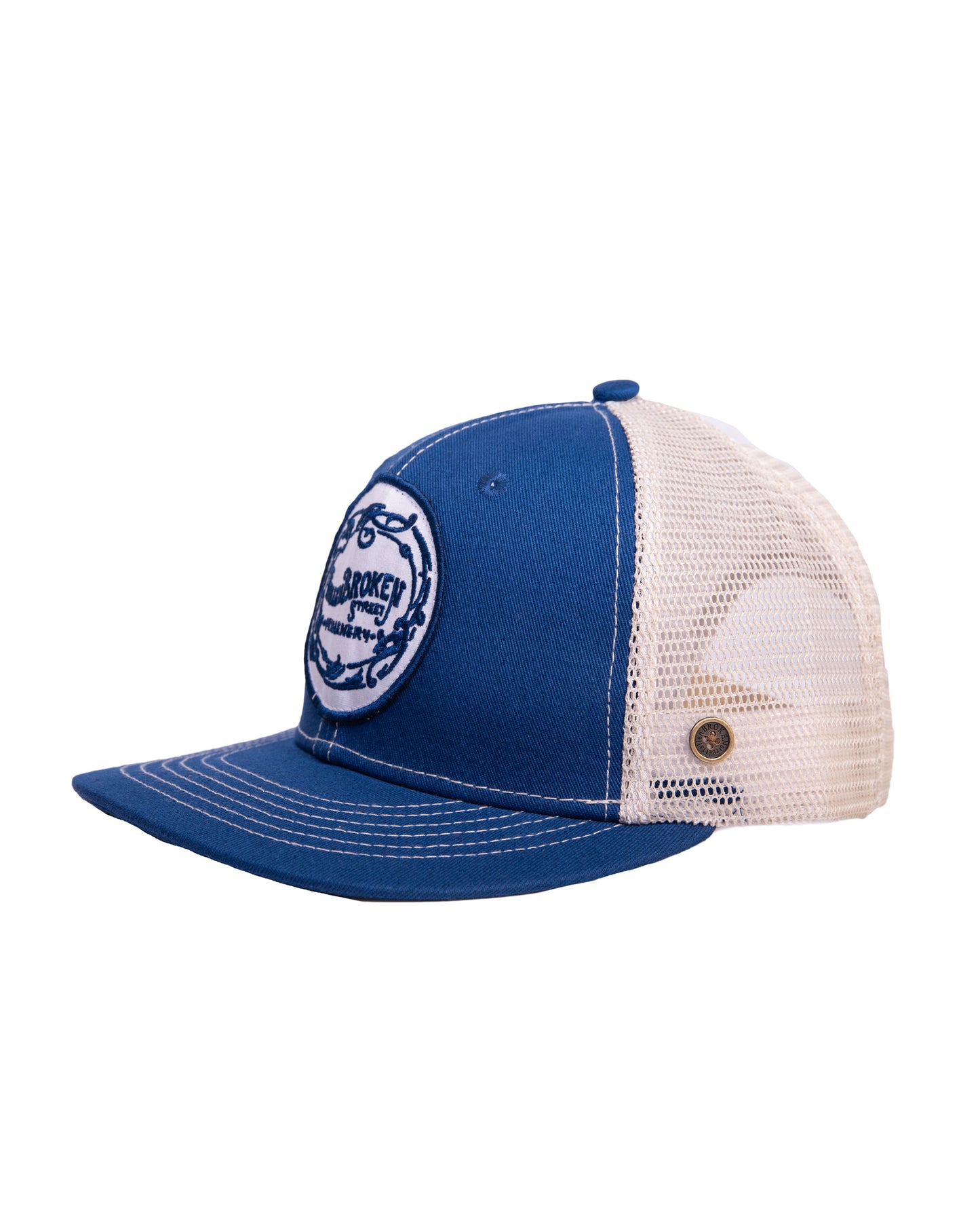 Rear view of adjustable mesh back cap with snap closure