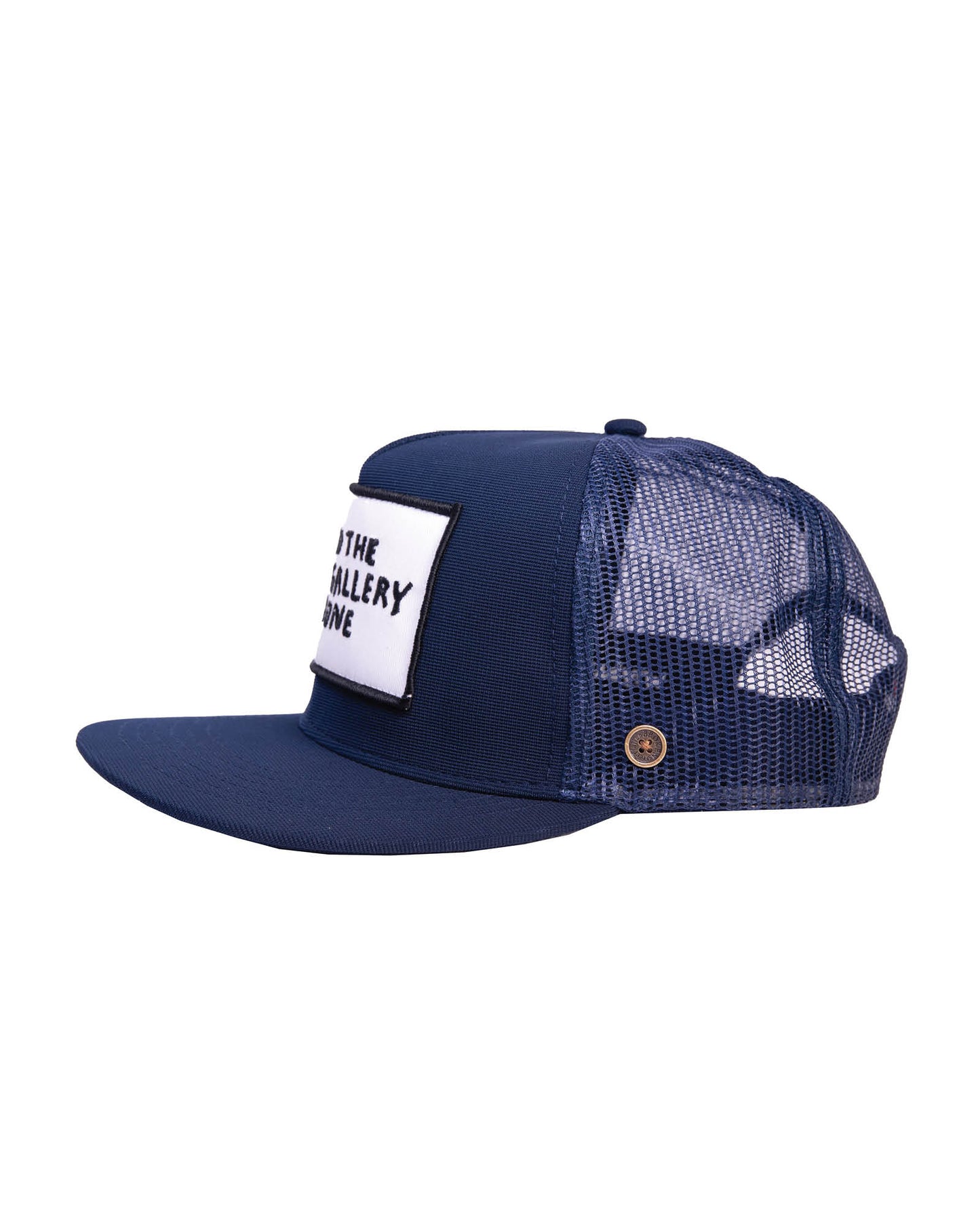 Side view of navy trucker cap with white patch