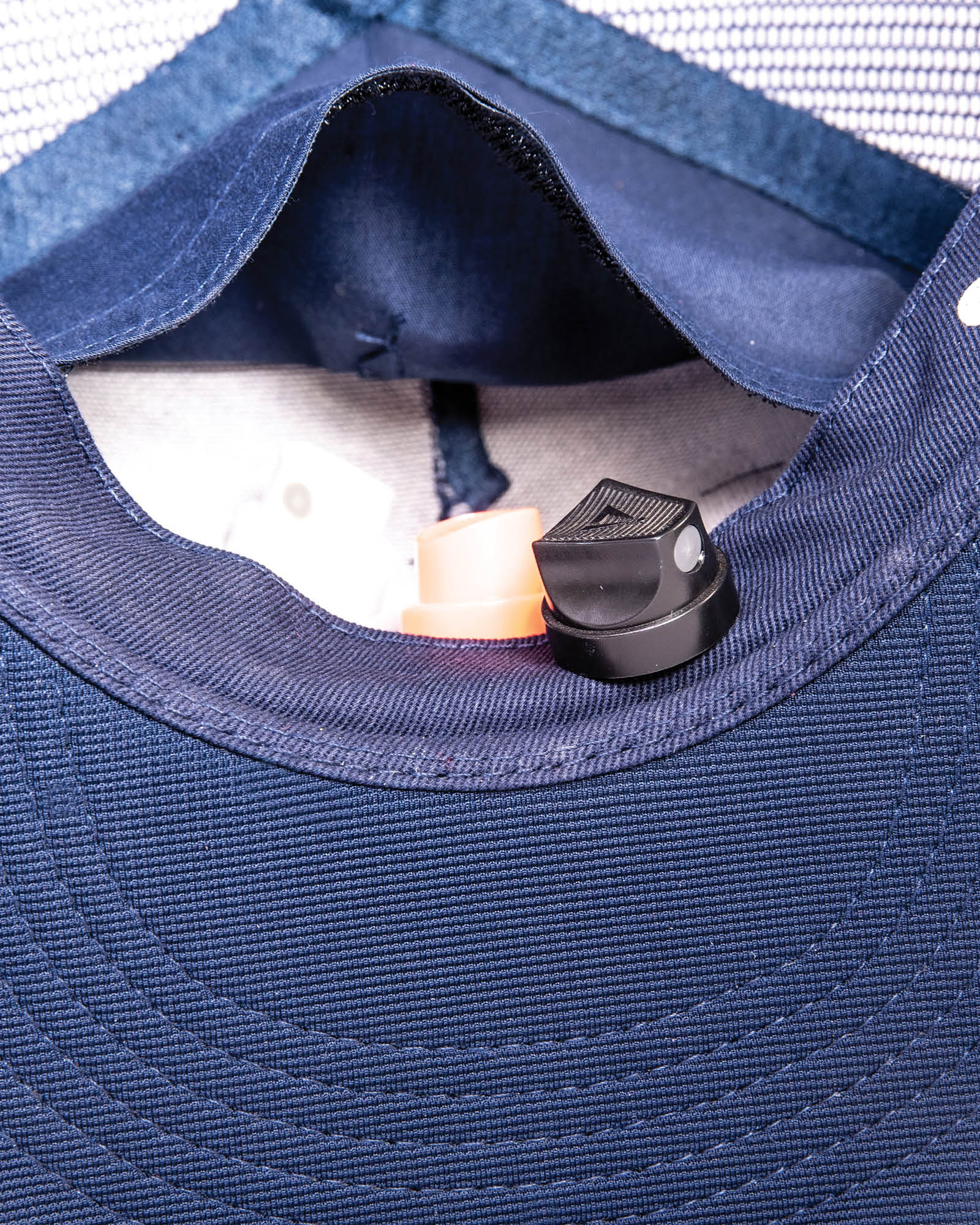 Secret pocket lining inside navy trucker cap