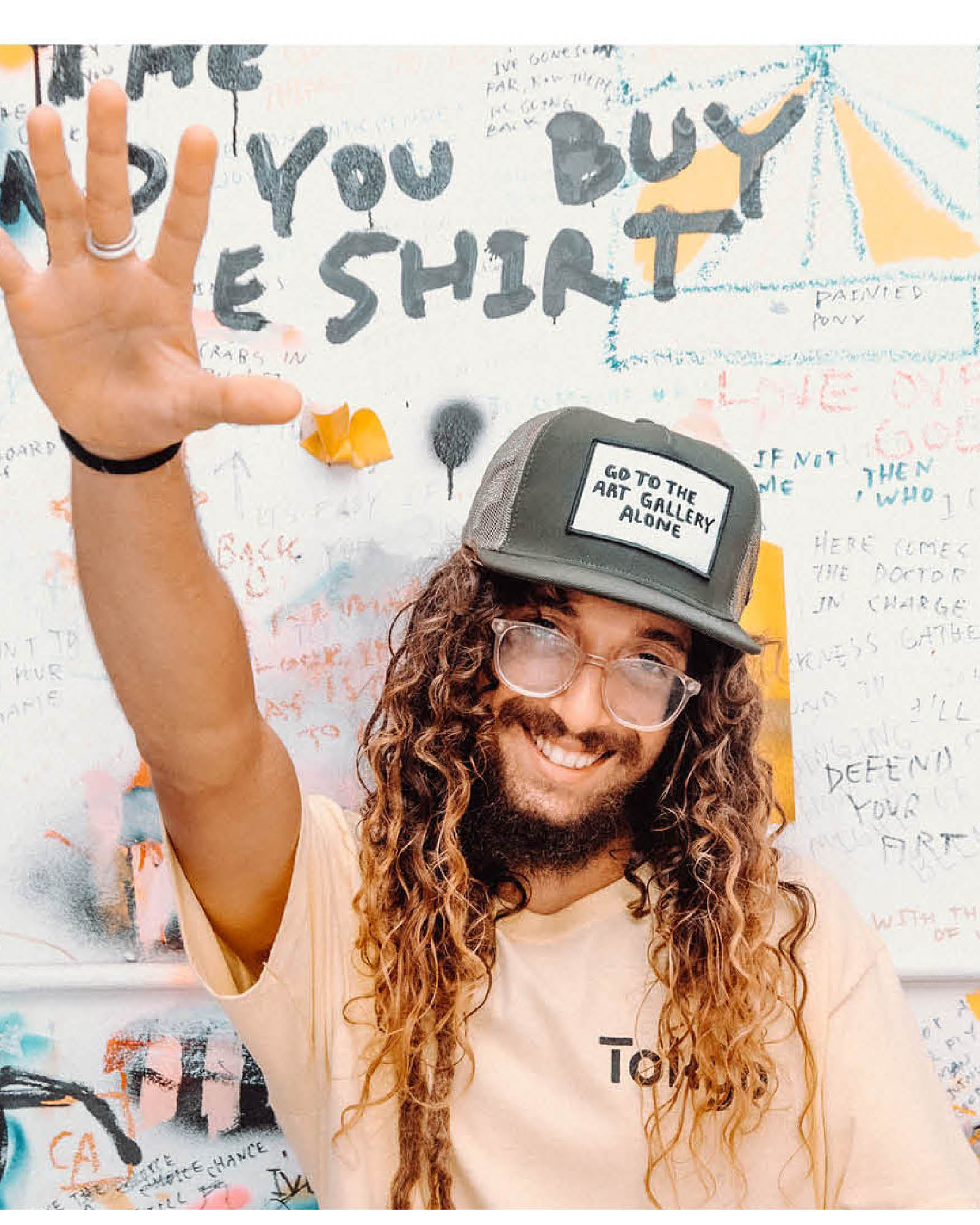 "Model wearing the FBS x Marty Baptist Gallery Cap in army green – street style artist collaboration cap"