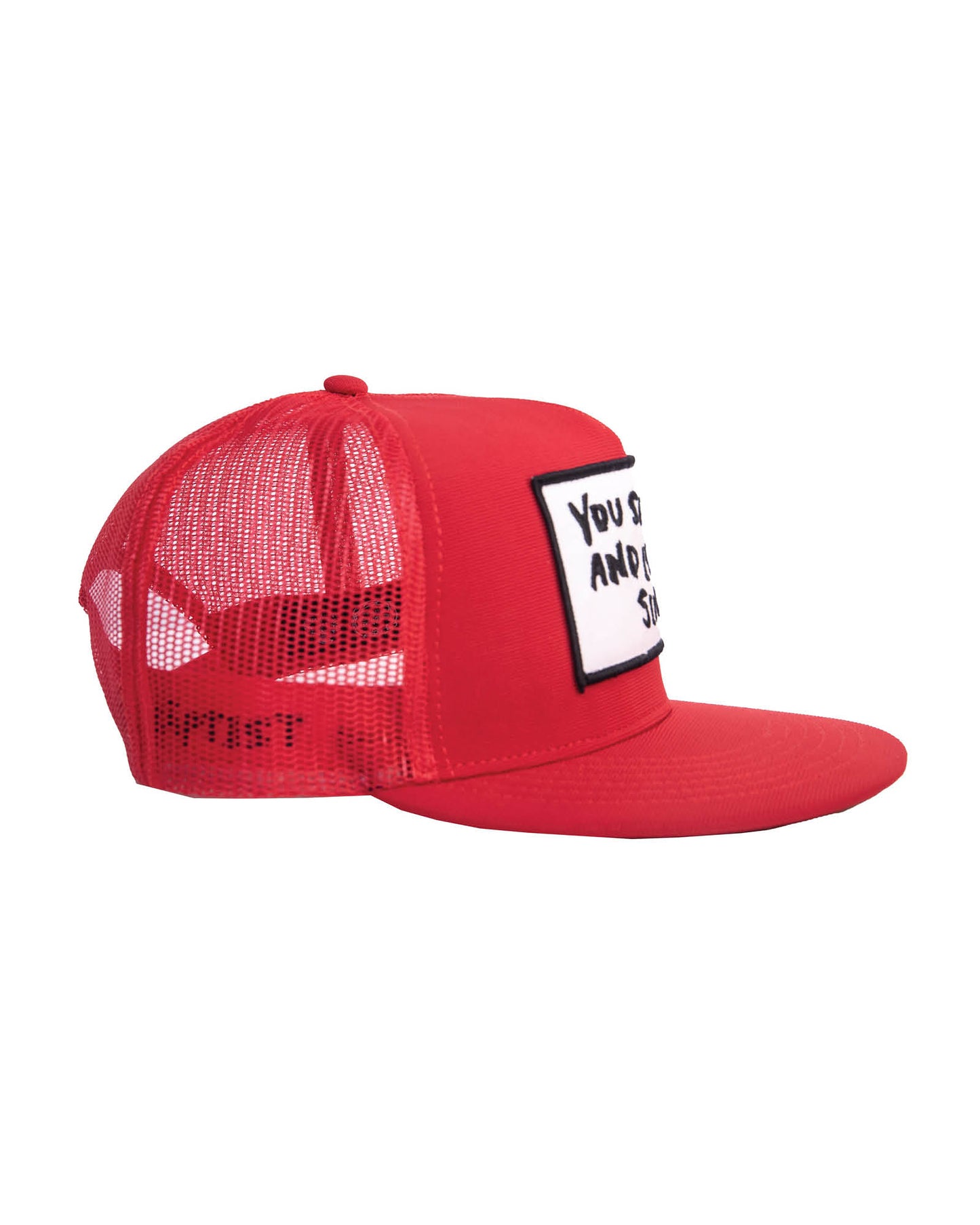 Side view of red Strum Cap by FallenBROKENstreet and Marty Baptist showing mesh panels and patch detail