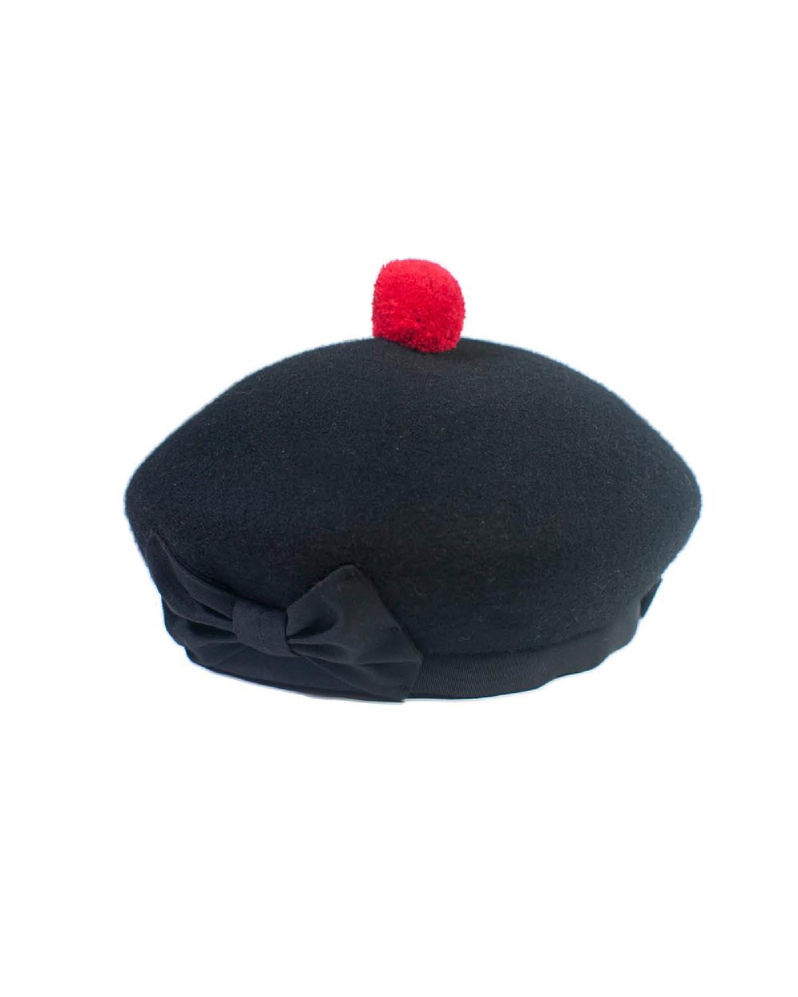 The Minnie Beret by FallenBROKENstreet. Black wool beret with red pom-pom and bow detail, featuring signature branded button. Parisian-inspired unisex hat crafted from 100% Australian wool with UPF 50+ protection.