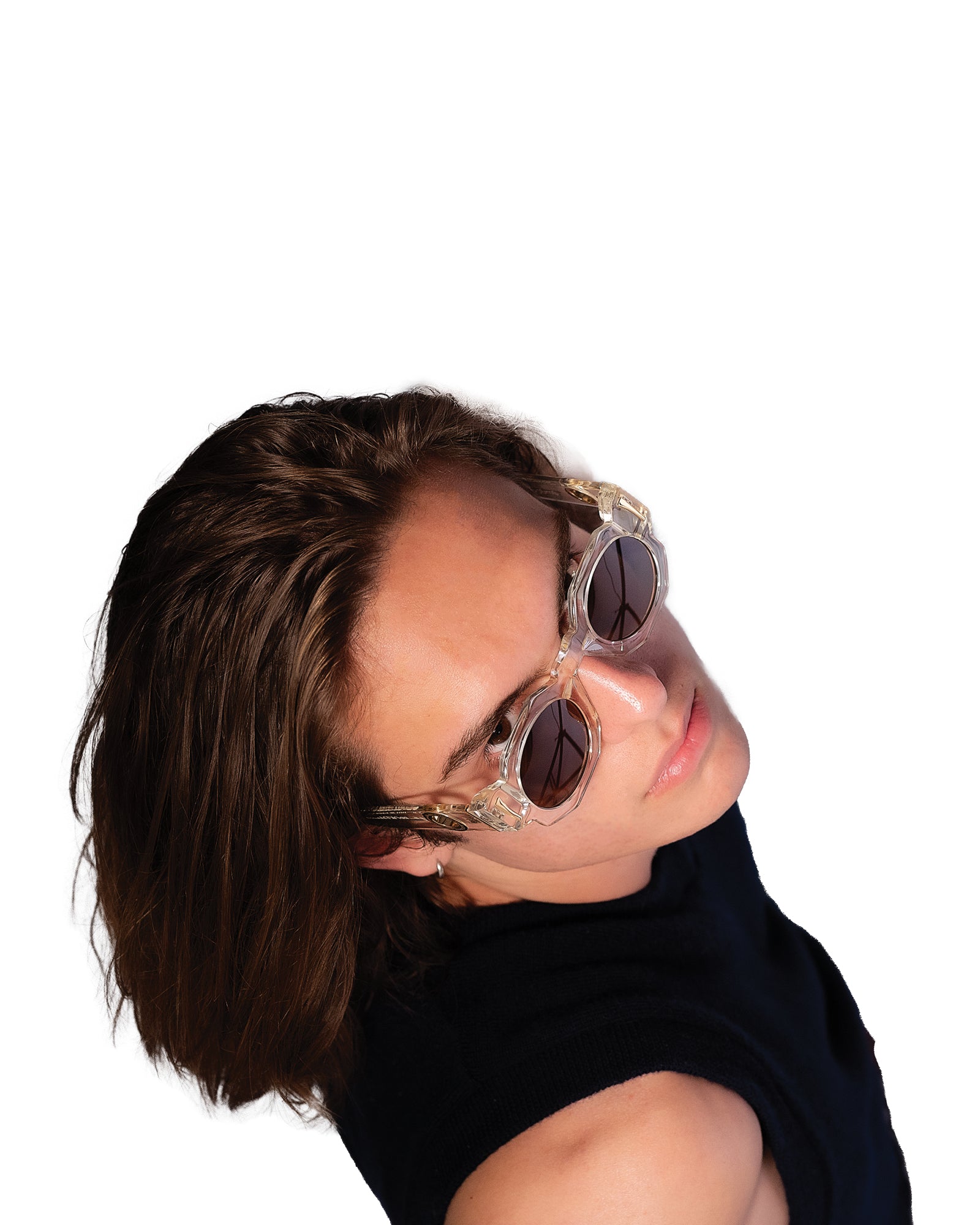 model tilting their head in Fallenbrokenstreet's Skywalker/Black sunglasses. A playful pose showing face fit, lens shape, and how the gold accents catch light. Ideal for ecomm and editorial storytelling.