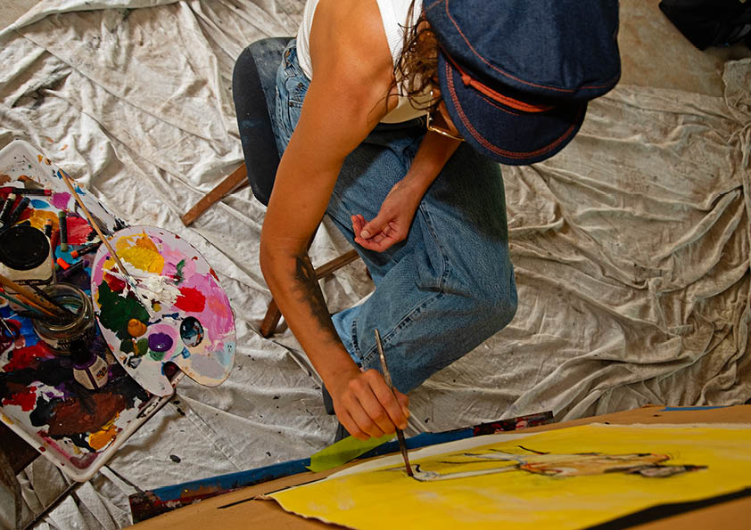 Detail shot of The Original Kyte Cap – Dark Indigo showing rope accent and brass stud buttons. Made from cotton denim with sheepskin leather inner band.