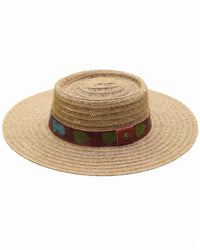 Straw hat with a decorative band on a white background