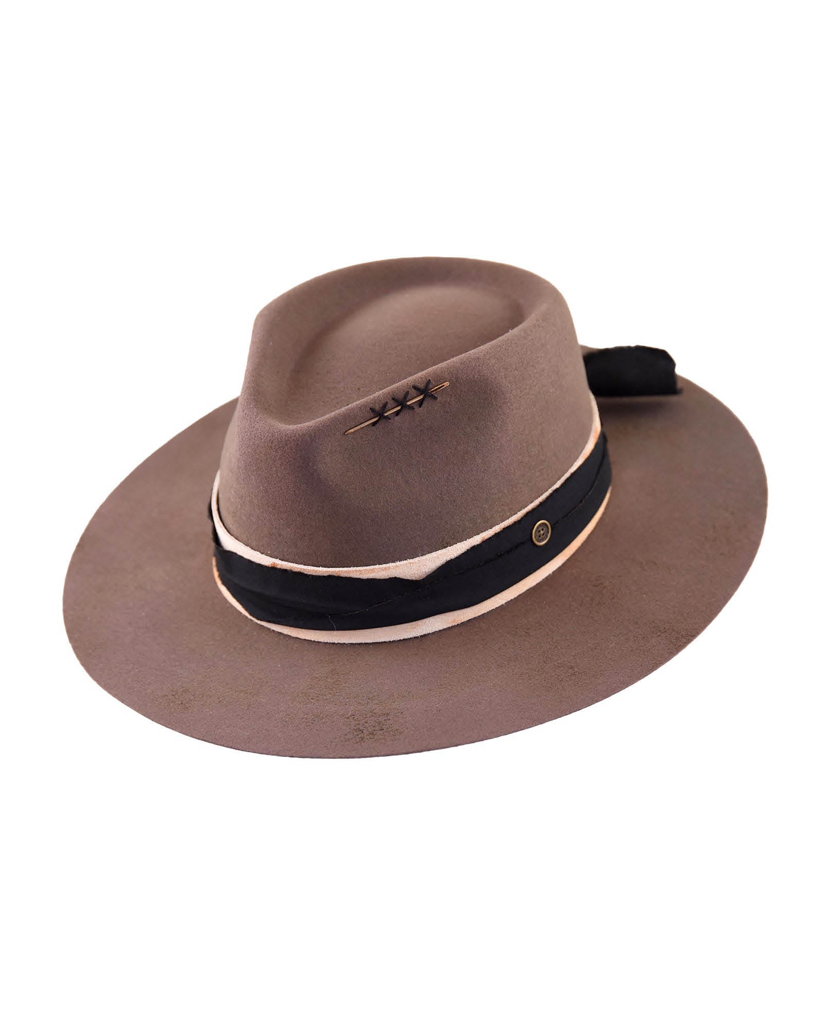 A warm brown vintage felt hat from FallenBROKENstreet, shown front-facing on a white background. The Zephyr features a frayed cotton outer band, subtle patina finish, and wide 75mm brim. Crafted from 100% Australian wool with signature golden needle detailing. A classic adventure hat designed for sun protection and timeless style. Unisex and ideal for all-season wear. UPF 50+ certified.
