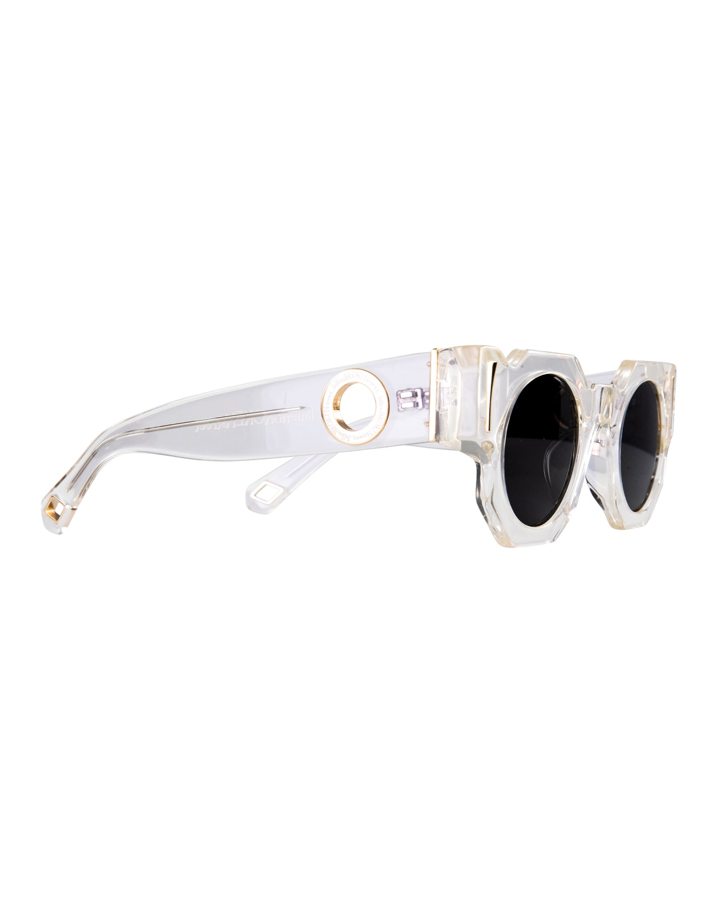 Side view close-up of The Cosmos – Skywalker/Black acetate sunglasses. Black polarised lenses with detailed gold hardware and visible dual chain compatibility. A technical angle highlighting quality craftsmanship and materials. Ideal for customers evaluating design and fit.