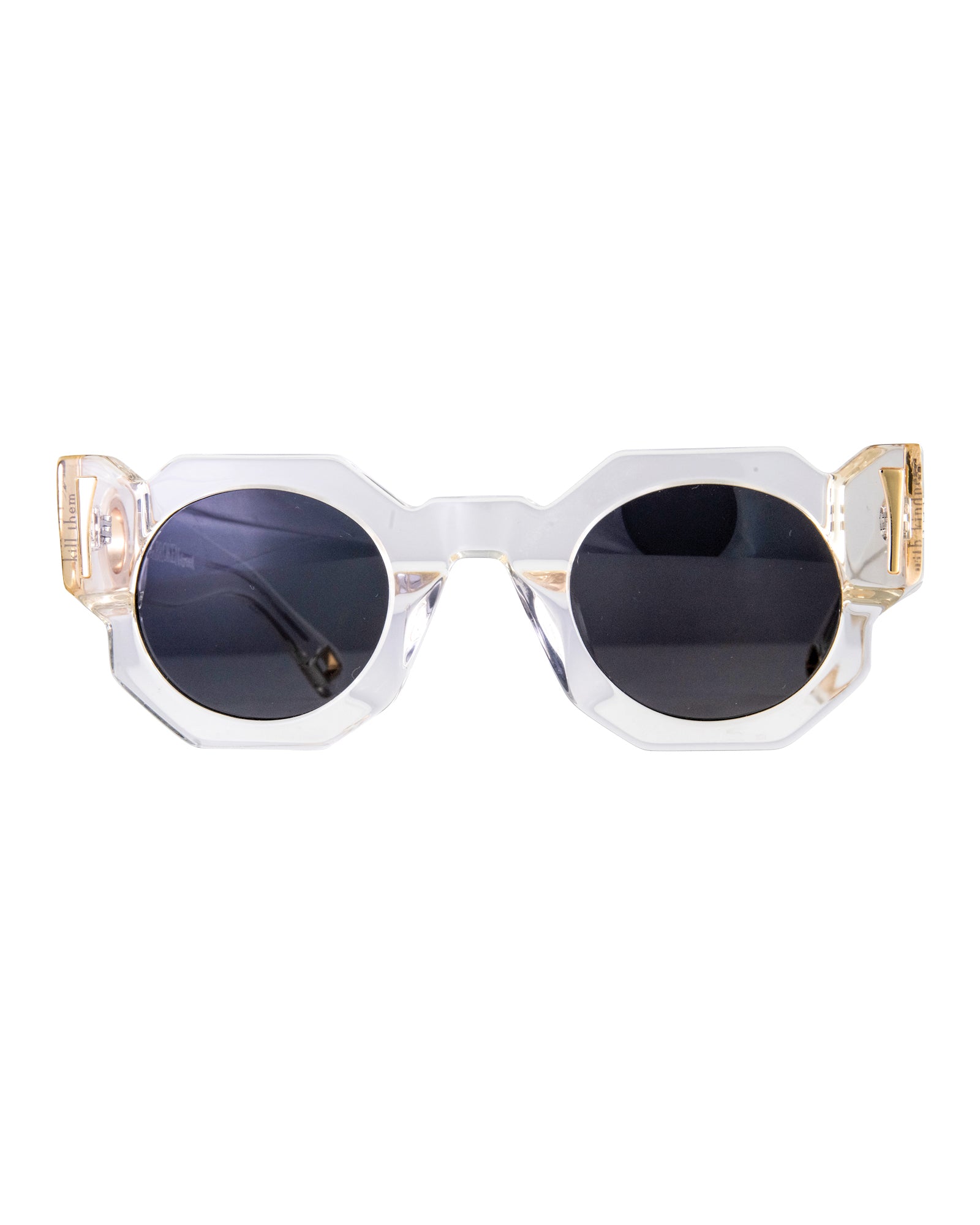 Close-up product image of Fallenbrokenstreet’s The Cosmos sunglasses in Skywalker/Black. Featuring a clear acetate frame with black polarised lenses and 24k gold finishings, ideal for bold, fashion-forward styling. Chain-compatible front and back. Perfect hero shot for Shopify or social media.