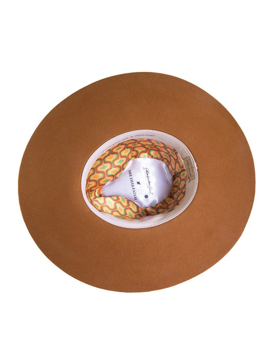 Inside view of FBS x Nine Lives Bazaar Festival Hat featuring retro-inspired printed lining and adjustable cotton band