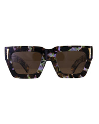 Front view of The Mischief – Moondust/Amber sunglasses with cosmic acetate frame and warm amber lenses. A bold, sculptural silhouette with contrast and attitude.