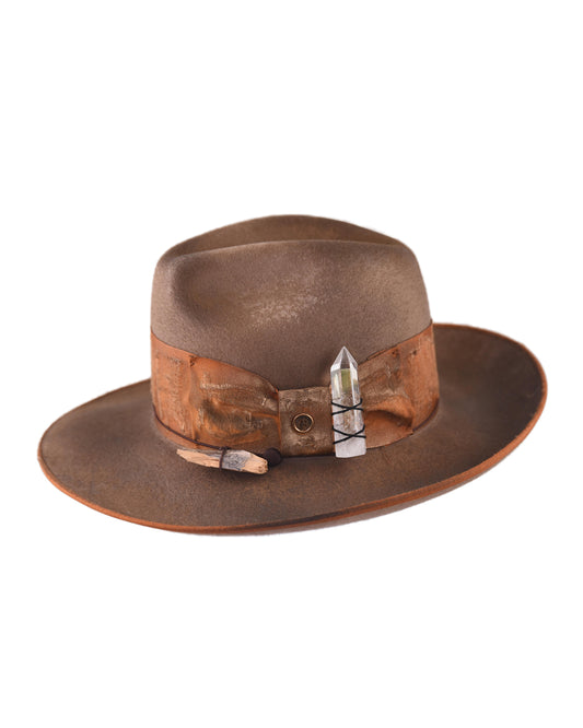 Front view of the FBS x SOMA hat showcasing its sculpted crown, crystal cluster detailing, and rich earthy tone. Crafted from Australian wool felt with a wide brim silhouette.