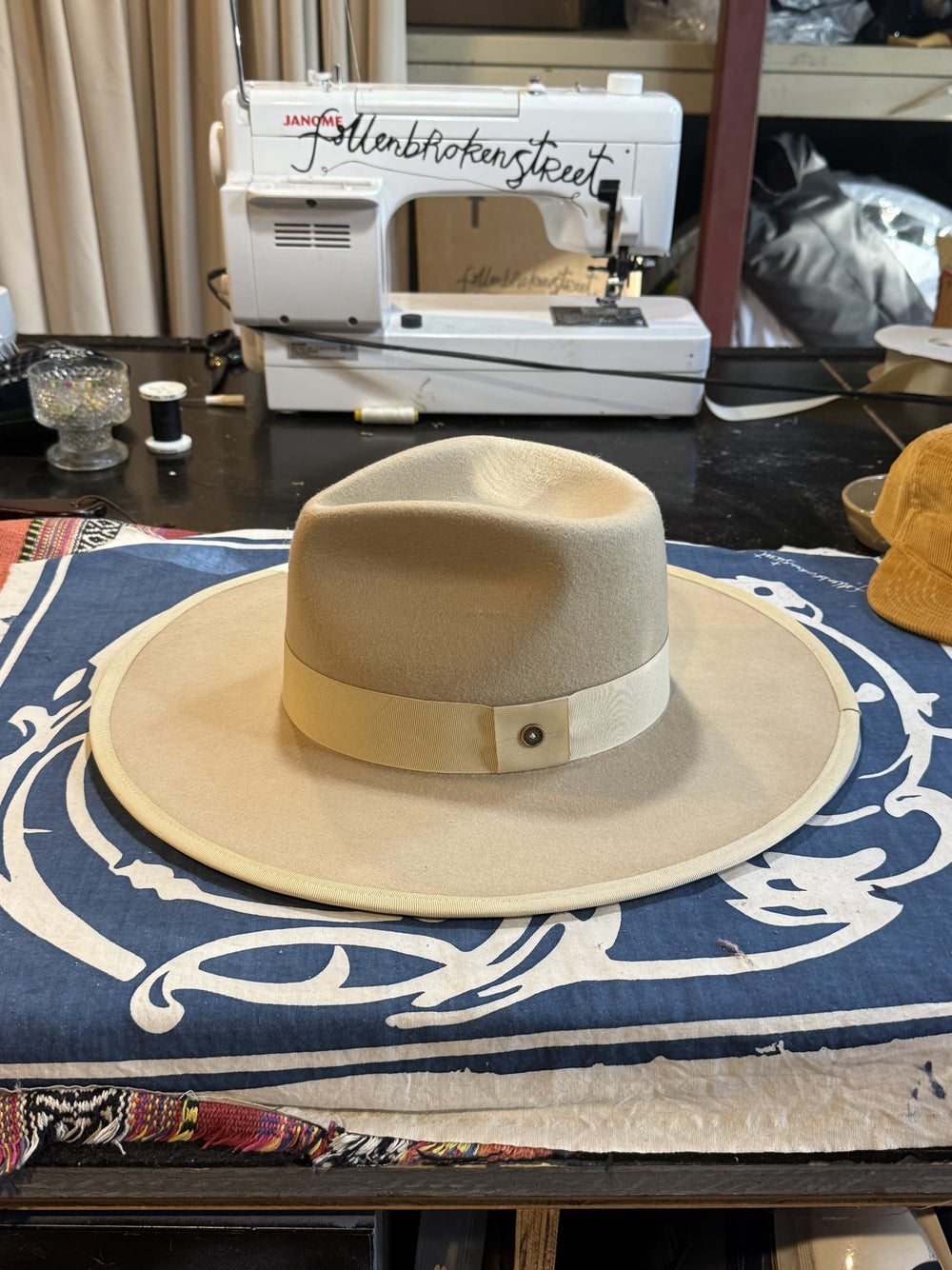 A worn-in FallenBROKENstreet felt hat