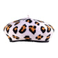 Product studio image of The Château Beret in leopard print with classic leather-bound edge and structured wool silhouette.

