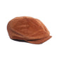 The Bandit Paperboy Cap by FallenBROKENstreet in tan corduroy. Classic 8-panel design with adjustable leather strap, silky lining, and signature metal button. A unisex vintage-inspired cap offering soft texture and timeless street style.