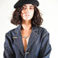 Slightly angled portrait of model with relaxed stance, showing the beret’s versatility.

