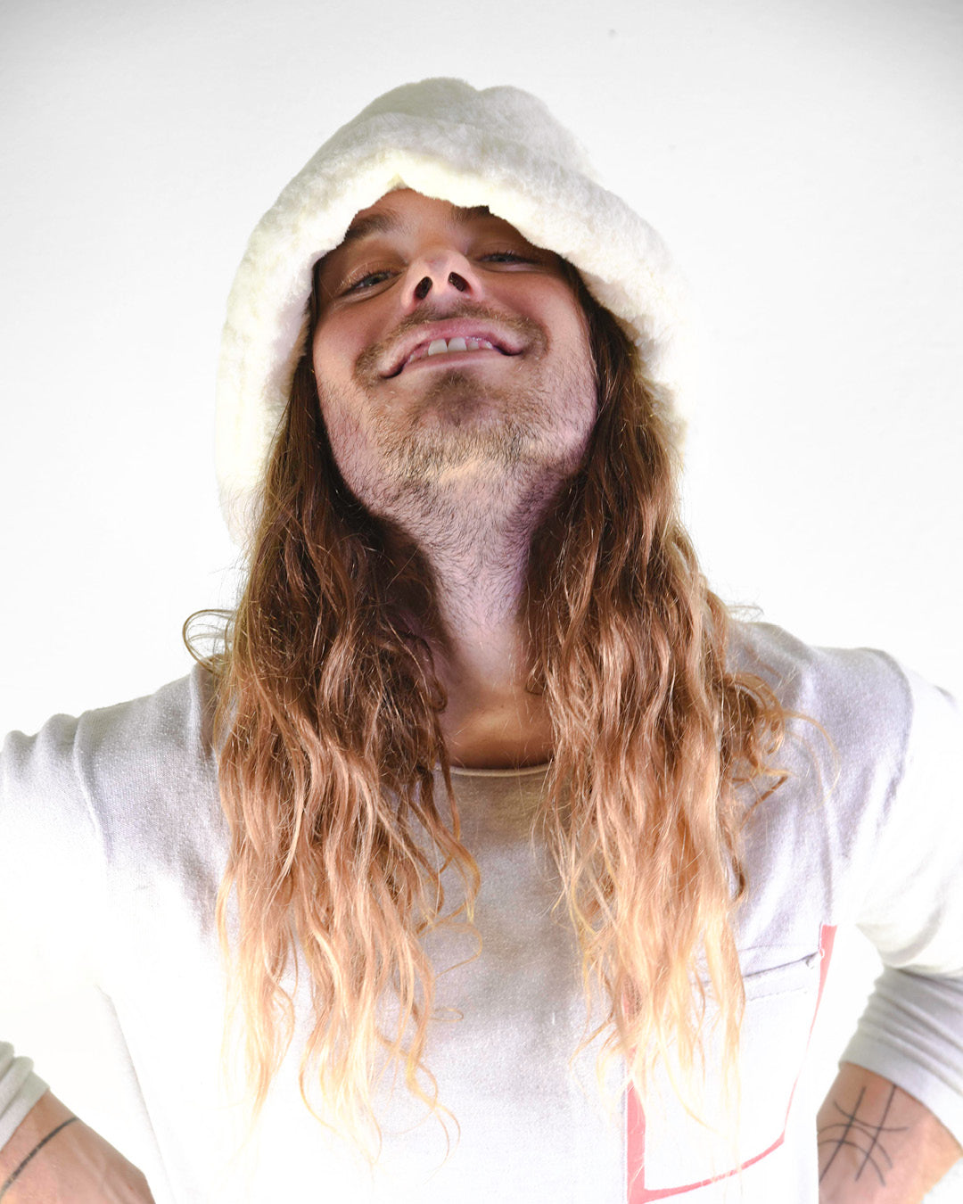 smiling man wearing a bucket hat