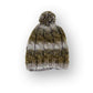The Cosmic Dust Beanie forest green close-up showing cable knit pattern and soft fibres with lightweight feel
