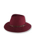 Maroon fedora hat with a brown band on a white background