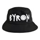 Black cotton bucket hat with bold white 'BYRON' embroidery from Fallenbrokenstreet, photographed from the front. Designed to represent Byron Bay with relaxed style and comfort.

