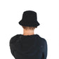 Back shot of the unisex Byron bucket hat in black, made from breathable cotton twill. Comfortable, timeless, and sun-ready.

