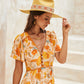 Model holding mustard felt hat, smiling – casual boho outfit

