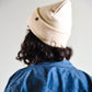 Back view Beige Lucks Beanie in premium wool blend, ribbed knit design, unisex flexible fit.