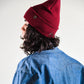 back view of Wine Lucks Beanie in soft wool blend, unisex design with ribbed knit and folded cuff.

