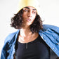 Model wears FallenBROKENstreet Lucks Beanie in Buttercup yellow, ribbed knit, flexible fit, signature logo badge.