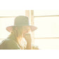 Model wearing The Midnight Traveller – Wine by FallenBROKENstreet. Unisex Australian wool felt hat with 7cm brim and cotton comfort band.