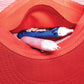 Unique secret stash pocket inside the foam crown of the red cap.

