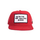 Close-up of the FBS x Marty Baptist Art Gallery Cap in bold red with a structured foam front. This hat features a striking embroidered patch that reads “Go to the art gallery alone,” offering a thought-provoking statement in classic Baptist style. Designed in collaboration with artist Marty Baptist, the trucker cap includes a breathable red mesh back, a sturdy pre-curved brim, and an adjustable snapback closure for all-day comfort. Ideal for artists, freethinkers, and streetwear fans alike, this cap is made