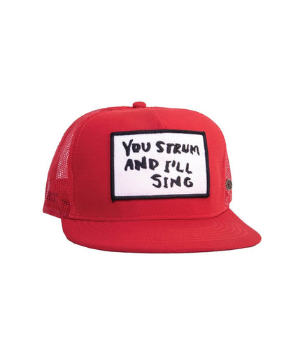 FallenBROKENstreet red mesh trucker cap with embroidered patch reading "You Strum and I’ll Sing" – front view

