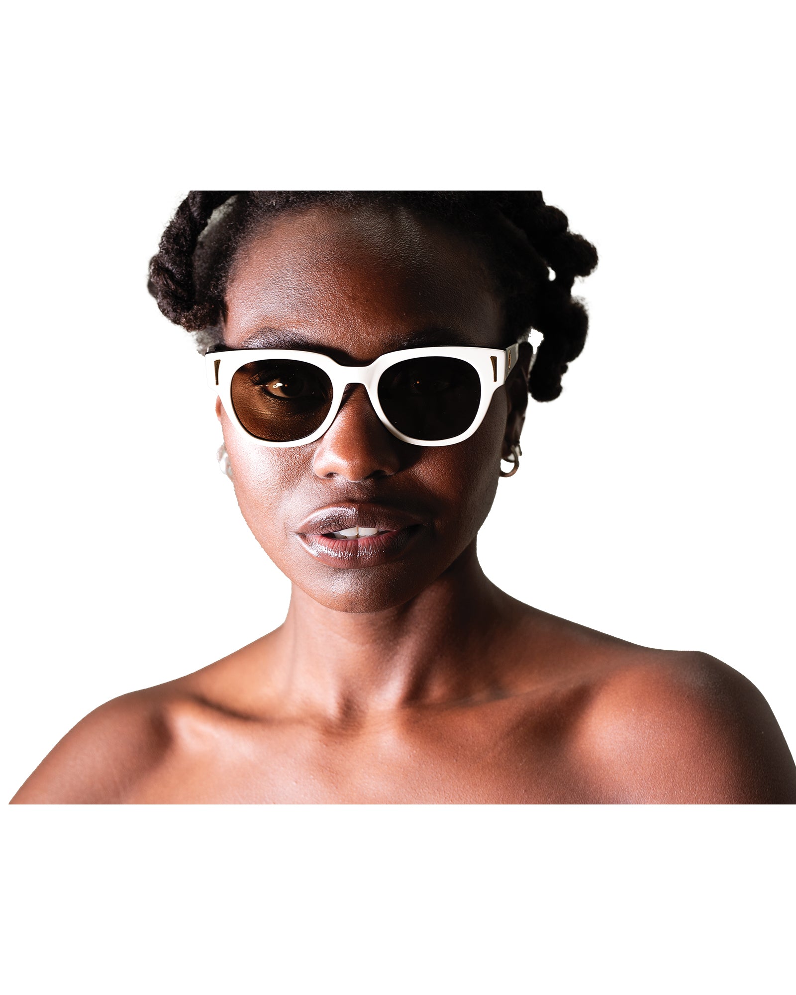 FallenBROKENstreet model in NYX White on Black sunglasses against clean backdrop

