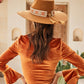 Back view of model wearing Nine Lives Bazaar x Fallenbrokenstreet festival hat with ribbon band and 12cm brim

