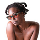 sly look from model wearing FallenBROKENstreet NYX sunglasses – Galaxy frame with pink polarised lenses

