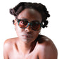 models stares intently in FallenBROKENstreet NYX sunglasses – Galaxy frame with pink polarised lenses


