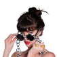 Model wearing the SUPERNATURAL Chain – Interstellar, styled with oversized FBS sunglasses. The bold acetate links bring an elevated streetwear-meets-galaxy vibe.