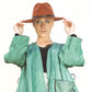 Model wearing The Ratatat Felt Hat – Rust at The David Bromley Estate. Unisex wool felt fedora with cotton inner band and UPF 50+ protection.