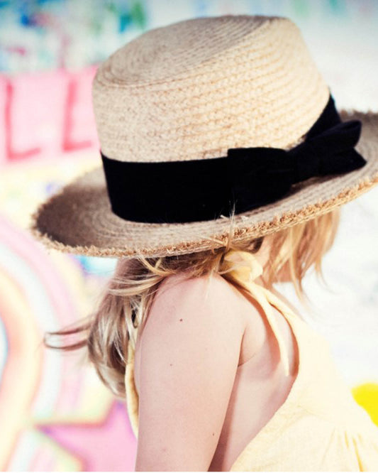 Kids River Straw Hat, woven straw design with velvet bow band and 53.5cm fit.