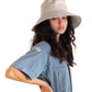 A female model wearing The Sandbar in natural linen, styled with a relaxed denim shirt. The image captures the soft drape of the hat’s semi-floppy brim and minimalist design, suited to sun protection and everyday wear. A lightweight staple from the bucket hats collection.

