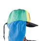 Side profile – Side view of Single Fin Mingle cap showing adjustable chin cord and blue protective neck cape.

