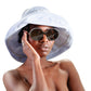 THE ORBIT sunglasses styled with casual bucket hat – bold round lenses from Fallenbrokenstreet

