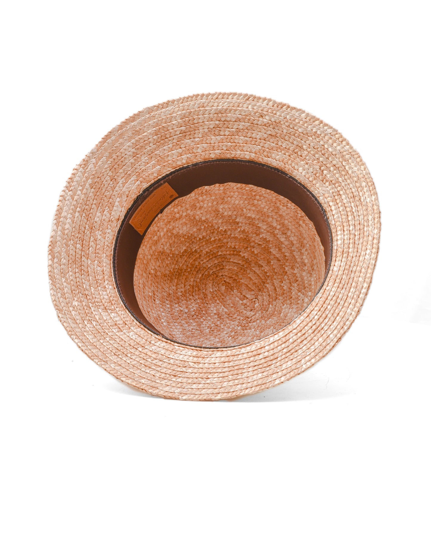 Woven straw hat on a white background