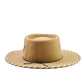Beige cowboy hat with a black band on a white background