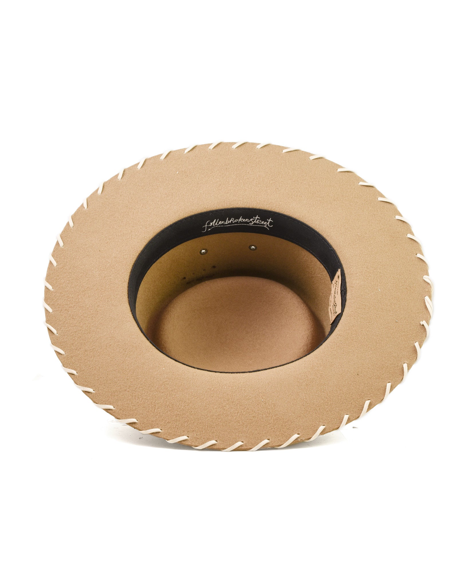 Inside view Trailblazer Felt Hat by FallenBROKENstreet. Australian wool felt with leather inner band, whipstitch brim, and feather accent. Unisex design offering UPF 50+ sun protection and heritage cowboy inspiration, built for festivals, travel, and rugged daily wear.