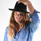 Man wearing the dingo hat in black